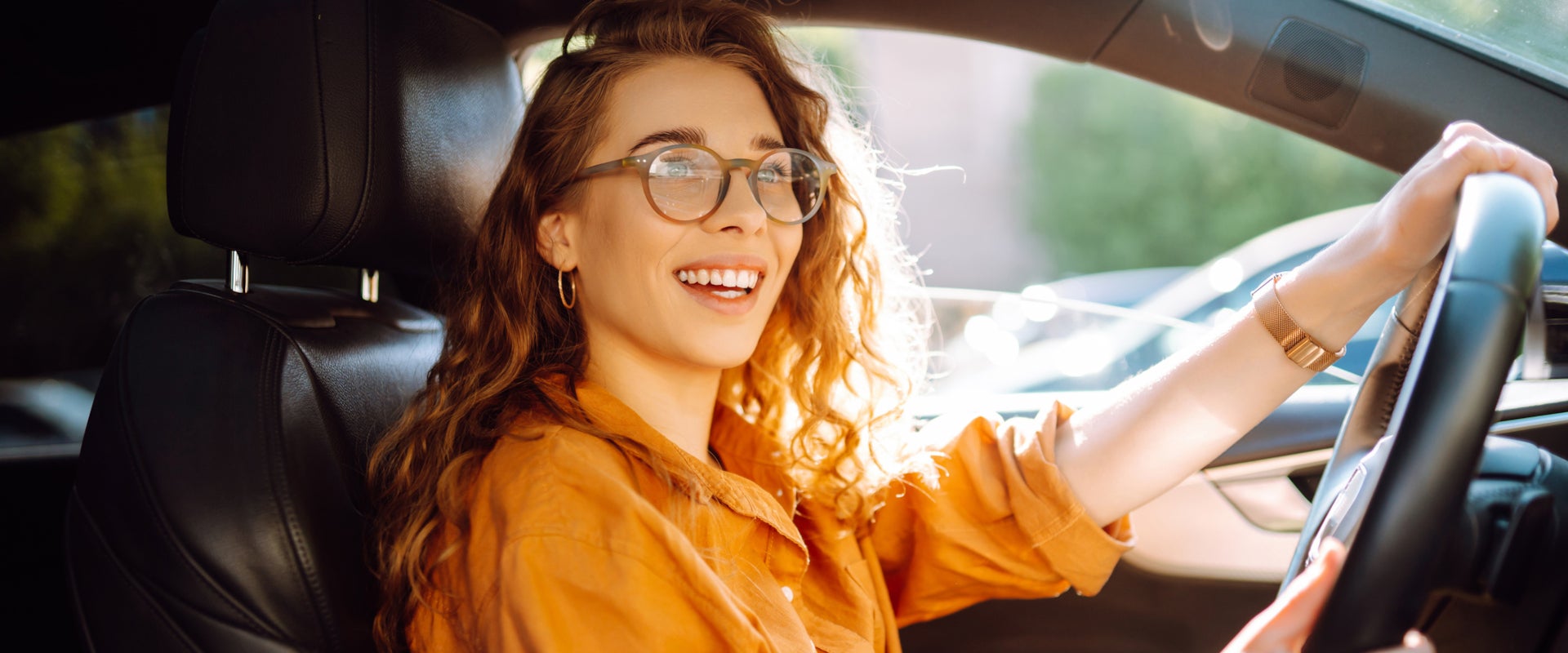 First time buyer driving in her car